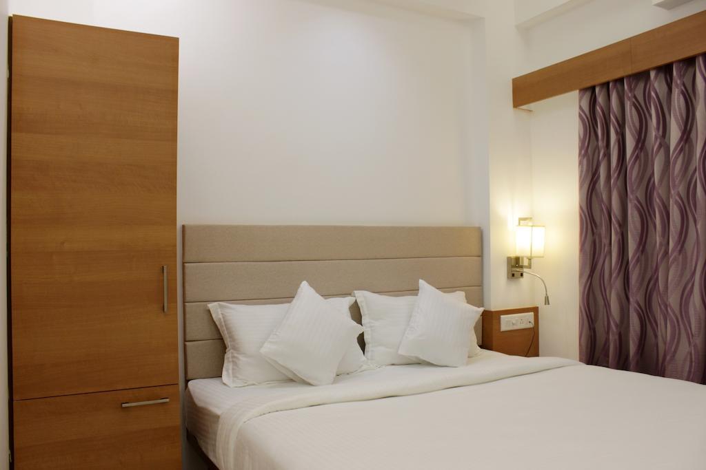 Hotel Ashray Inn Ahmadábád Pokoj fotografie
