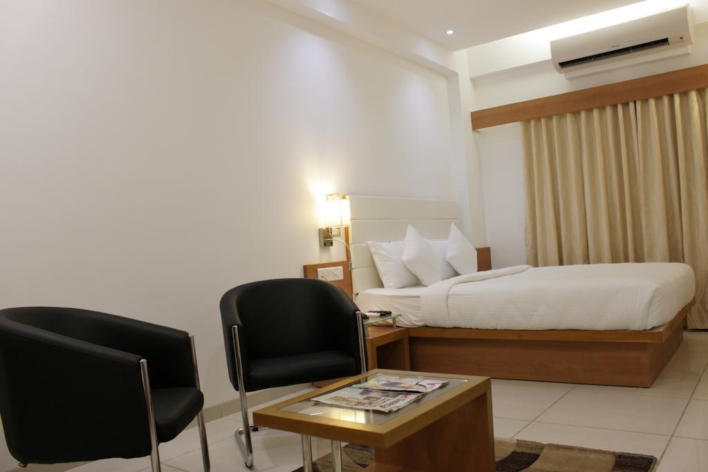 Hotel Ashray Inn Ahmadábád Pokoj fotografie