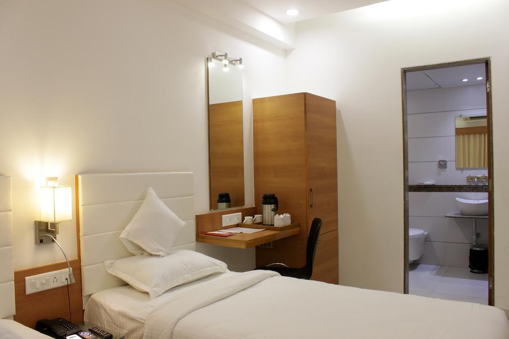 Hotel Ashray Inn Ahmadábád Pokoj fotografie