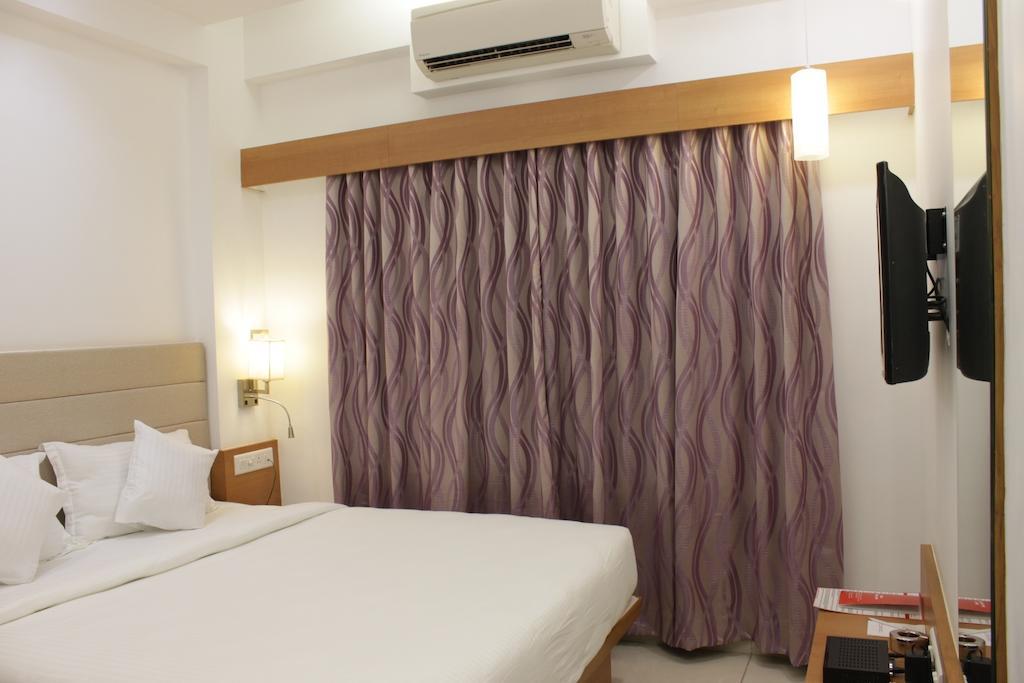 Hotel Ashray Inn Ahmadábád Pokoj fotografie